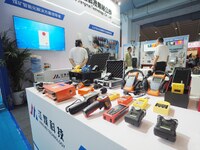 Visitors are visiting ''Coal Mine Safety Inspection Equipment'' at the 2024 Beijing International Coal Mining Technology and Equipment Exhib...