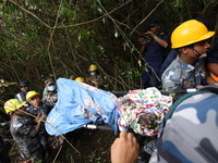 A helicopter carrying four Chinese nationals is crashing in Nuwakot District, Nepal, on August 7, 2024. A total of 5 people, including the p...