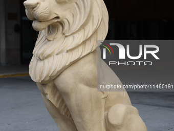 A lion statue is standing outside the Fairmont Royal York Hotel in Toronto, Ontario, Canada, on June 12, 2024. (