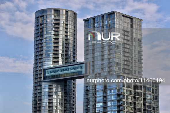 A walkway is leading from tower to tower of condominium buildings in Toronto, Ontario, Canada, on June 12, 2024. 