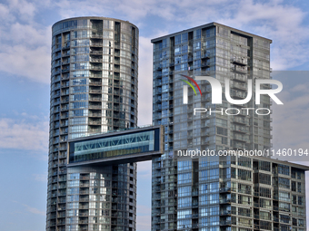 A walkway is leading from tower to tower of condominium buildings in Toronto, Ontario, Canada, on June 12, 2024. (