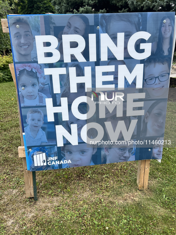 A sign for the Jewish National Fund (JNF) is outside a synagogue in Toronto, Ontario, Canada, on July 30, 2024. These signs are being target...