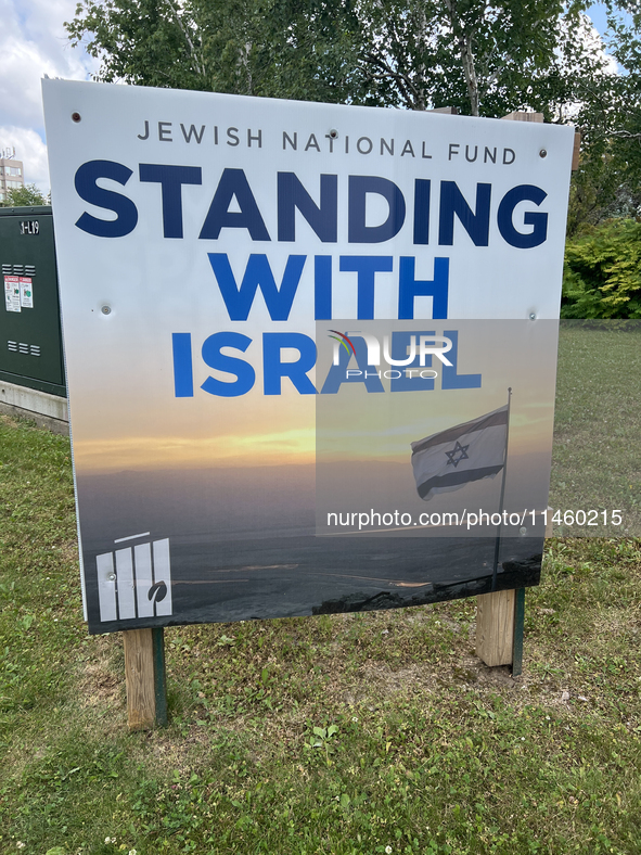 A sign for the Jewish National Fund (JNF) is outside a synagogue in Toronto, Ontario, Canada, on July 30, 2024. These signs are being target...