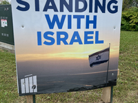 A sign for the Jewish National Fund (JNF) is outside a synagogue in Toronto, Ontario, Canada, on July 30, 2024. These signs are being target...