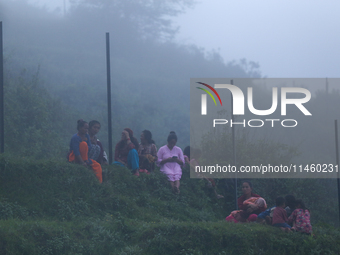 Locals are gathering near the site of the Air Dynasty Helicopter crash in Nuwakot District, Nepal, on August 7, 2024. A total of 5 people ar...