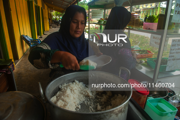 The residents of the Matfa village (Majelis Taqlim Fardhu Ain) in Langkat, North Sumatra, Indonesia, on August 06, 2024, are actively implem...