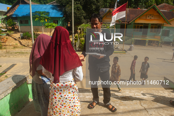 On August 06, 2024, in Langkat, North Sumatra, Indonesia, Risky Cahyadi, Chief of Indonesia's Photojournalist Organisation (PFI) of Medan, i...