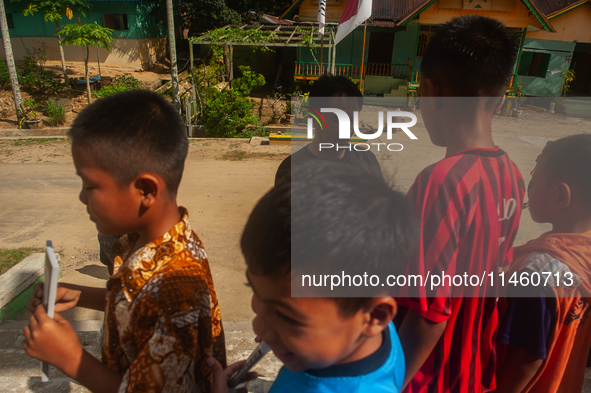 On August 06, 2024, in Langkat, North Sumatra, Indonesia, Risky Cahyadi, Chief of Indonesia's Photojournalist Organisation (PFI) of Medan, i...