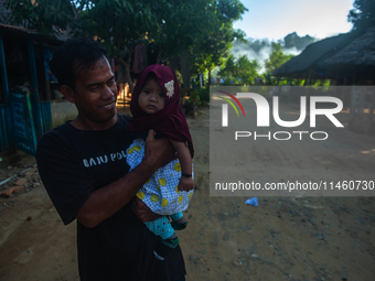 The residents of the Matfa village (Majelis Taqlim Fardhu Ain) in Langkat, North Sumatra, Indonesia, on August 06, 2024, are actively implem...