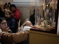 A crowd is leaving the Buenos Aires neighborhood of Liniers as part of the celebration of the day of San Cayetano, the patron saint of bread...