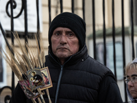 A crowd is leaving the Buenos Aires neighborhood of Liniers as part of the celebration of the day of San Cayetano, the patron saint of bread...