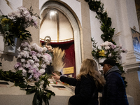 A crowd is leaving the Buenos Aires neighborhood of Liniers as part of the celebration of the day of San Cayetano, the patron saint of bread...