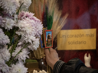 A crowd is leaving the Buenos Aires neighborhood of Liniers as part of the celebration of the day of San Cayetano, the patron saint of bread...