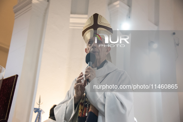 A crowd is leaving the Buenos Aires neighborhood of Liniers as part of the celebration of the day of San Cayetano, the patron saint of bread...