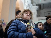 A crowd is leaving the Buenos Aires neighborhood of Liniers as part of the celebration of the day of San Cayetano, the patron saint of bread...