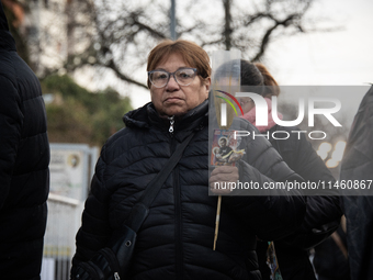 A crowd is leaving the Buenos Aires neighborhood of Liniers as part of the celebration of the day of San Cayetano, the patron saint of bread...