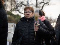 A crowd is leaving the Buenos Aires neighborhood of Liniers as part of the celebration of the day of San Cayetano, the patron saint of bread...