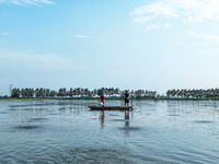 Aquaculture technicians are guiding crab feeding at Wanggou Village crab pond in Suqian, Jiangsu province, China, on August 7, 2024. (