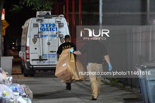 Crime scene investigators from the New York City police department are on scene investigating human remains found and are bringing out evide...