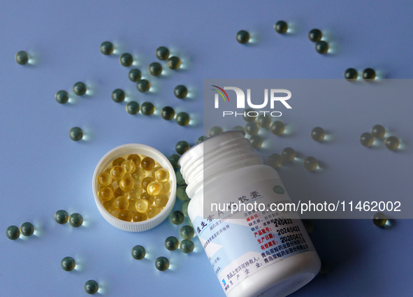 Vitamin A and vitamin E softgel capsules are being seen in Yichang, Hubei province, China, on August 8, 2024. German chemical giant BASF is...