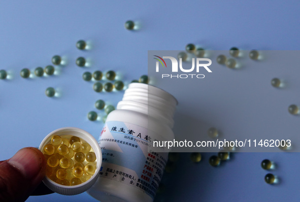 Vitamin A and vitamin E softgel capsules are being seen in Yichang, Hubei province, China, on August 8, 2024. German chemical giant BASF is...