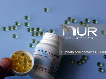 Vitamin A and vitamin E softgel capsules are being seen in Yichang, Hubei province, China, on August 8, 2024. German chemical giant BASF is...