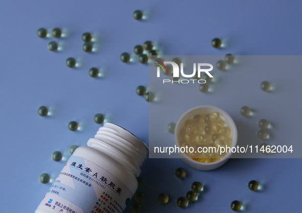 Vitamin A and vitamin E softgel capsules are being seen in Yichang, Hubei province, China, on August 8, 2024. German chemical giant BASF is...