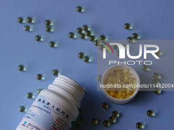 Vitamin A and vitamin E softgel capsules are being seen in Yichang, Hubei province, China, on August 8, 2024. German chemical giant BASF is...