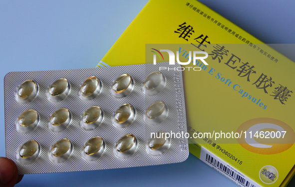 Vitamin A and vitamin E softgel capsules are being seen in Yichang, Hubei province, China, on August 8, 2024. German chemical giant BASF is...