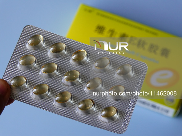 Vitamin A and vitamin E softgel capsules are being seen in Yichang, Hubei province, China, on August 8, 2024. German chemical giant BASF is...