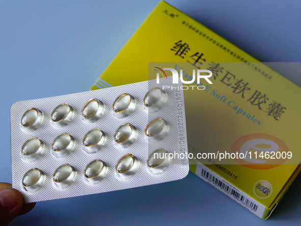 Vitamin A and vitamin E softgel capsules are being seen in Yichang, Hubei province, China, on August 8, 2024. German chemical giant BASF is...