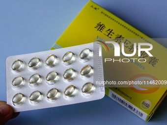 Vitamin A and vitamin E softgel capsules are being seen in Yichang, Hubei province, China, on August 8, 2024. German chemical giant BASF is...