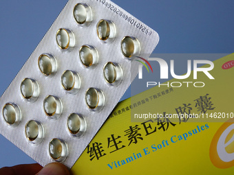 Vitamin A and vitamin E softgel capsules are being seen in Yichang, Hubei province, China, on August 8, 2024. German chemical giant BASF is...