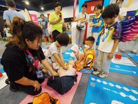 A child is experiencing cardiopulmonary resuscitation (CPR) at the first Beijing International Science Festival in Beijing, China, on August...