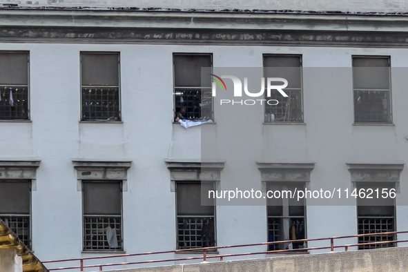 ''Help us, we can't take it anymore.'' These are the cries that are being heard outside the Poggioreale prison in Naples, Italy, on August 8...