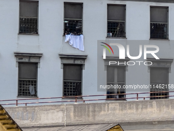 ''Help us, we can't take it anymore.'' These are the cries that are being heard outside the Poggioreale prison in Naples, Italy, on August 8...