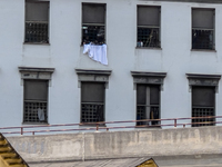 ''Help us, we can't take it anymore.'' These are the cries that are being heard outside the Poggioreale prison in Naples, Italy, on August 8...