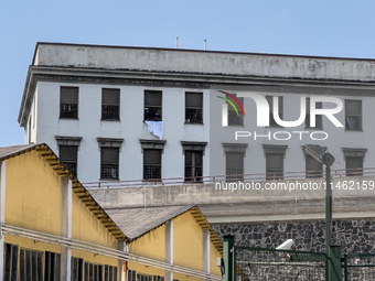 ''Help us, we can't take it anymore.'' These are the cries that are being heard outside the Poggioreale prison in Naples, Italy, on August 8...