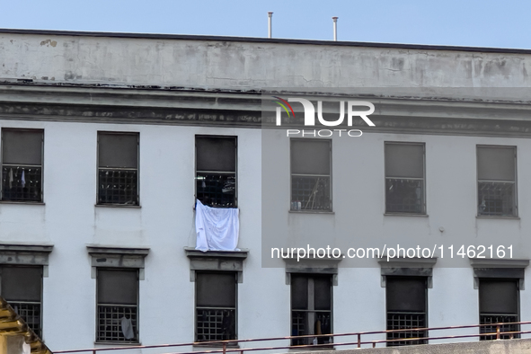 ''Help us, we can't take it anymore.'' These are the cries that are being heard outside the Poggioreale prison in Naples, Italy, on August 8...