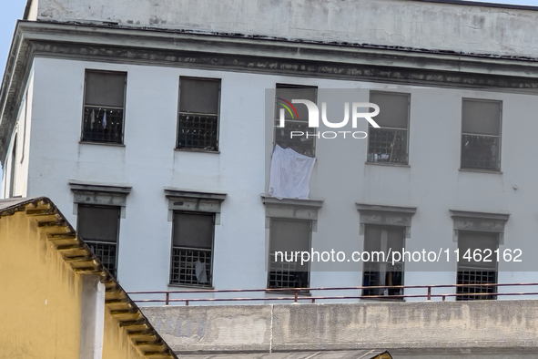 ''Help us, we can't take it anymore.'' These are the cries that are being heard outside the Poggioreale prison in Naples, Italy, on August 8...