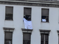 ''Help us, we can't take it anymore.'' These are the cries that are being heard outside the Poggioreale prison in Naples, Italy, on August 8...