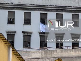 ''Help us, we can't take it anymore.'' These are the cries that are being heard outside the Poggioreale prison in Naples, Italy, on August 8...