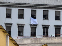 ''Help us, we can't take it anymore.'' These are the cries that are being heard outside the Poggioreale prison in Naples, Italy, on August 8...