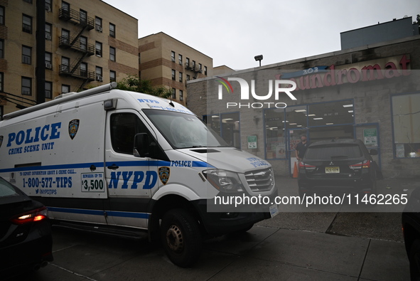 One person is being killed and one person is being injured in a stabbing inside a laundromat in Bronx, New York, United States, on August 8,...