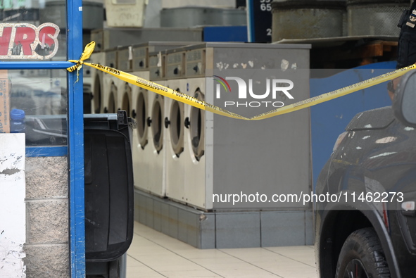 One person is being killed and one person is being injured in a stabbing inside a laundromat in Bronx, New York, United States, on August 8,...