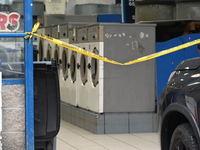 One person is being killed and one person is being injured in a stabbing inside a laundromat in Bronx, New York, United States, on August 8,...