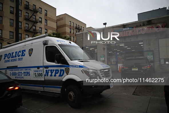 One person is being killed and one person is being injured in a stabbing inside a laundromat in Bronx, New York, United States, on August 8,...