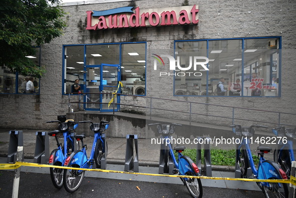 One person is being killed and one person is being injured in a stabbing inside a laundromat in Bronx, New York, United States, on August 8,...