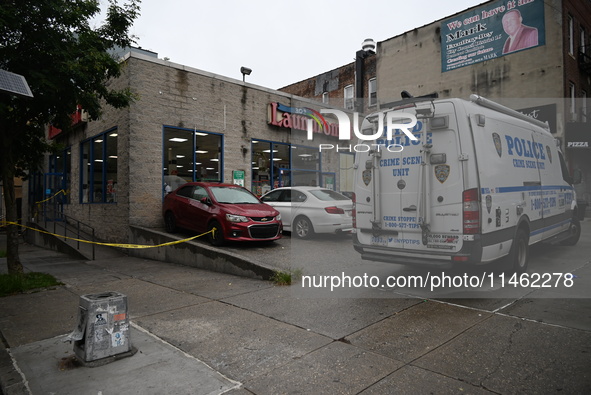 One person is being killed and one person is being injured in a stabbing inside a laundromat in Bronx, New York, United States, on August 8,...