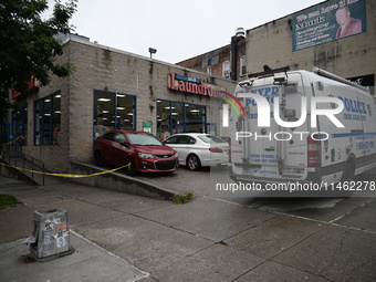 One person is being killed and one person is being injured in a stabbing inside a laundromat in Bronx, New York, United States, on August 8,...